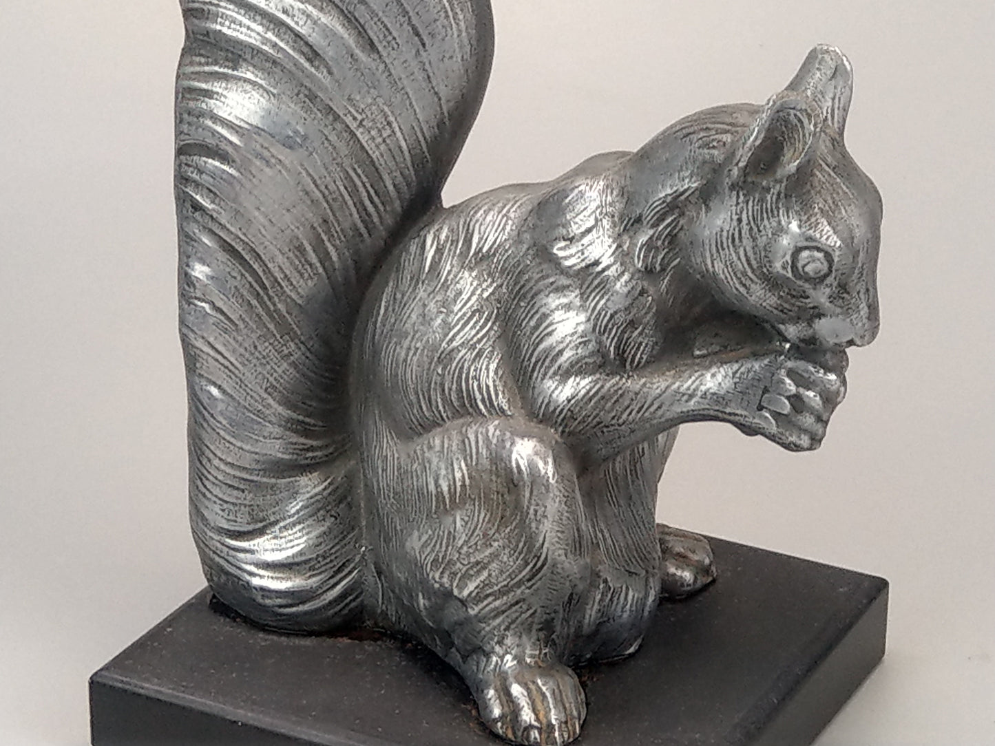 French Art Deco silver squirrel bookends slate base