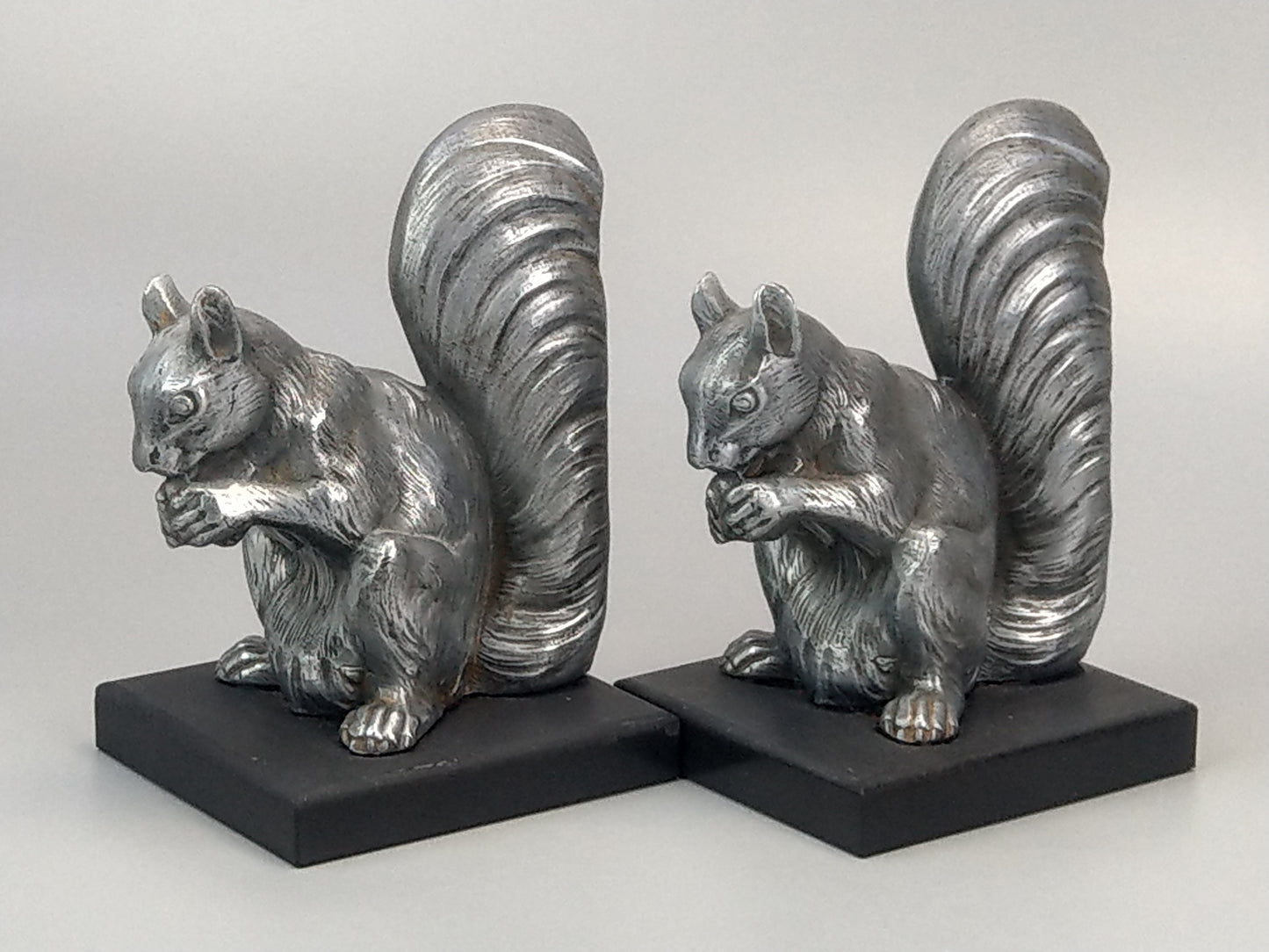 French Art Deco silver squirrel bookends slate base