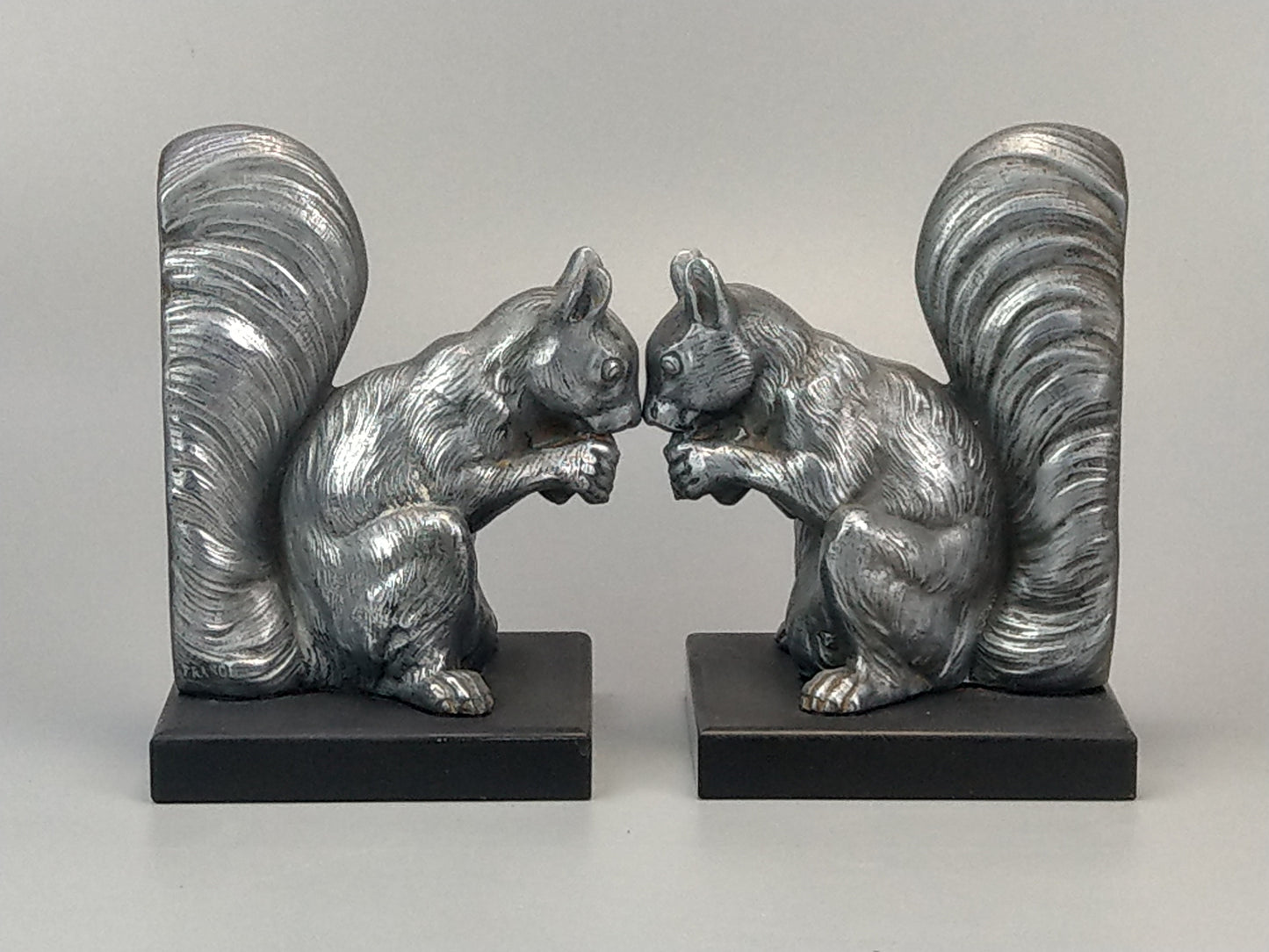 French Art Deco silver squirrel bookends slate base