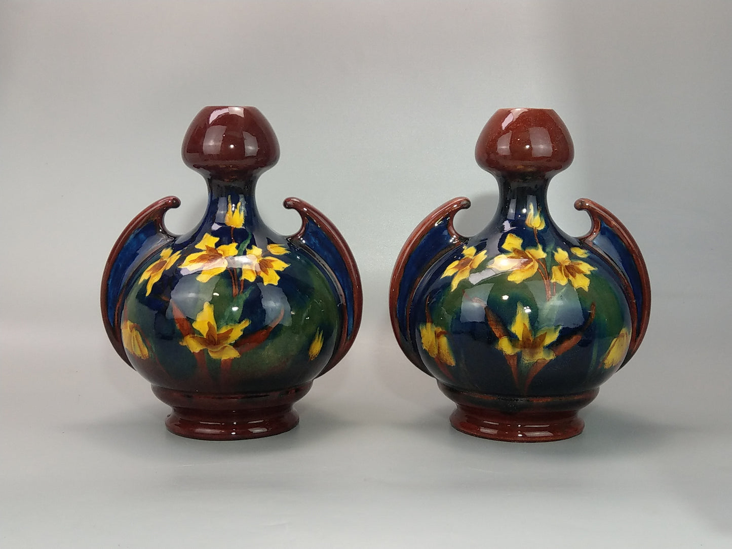 A Pair of Large Austrian Old Moravian Pottery Vases with Daffodils