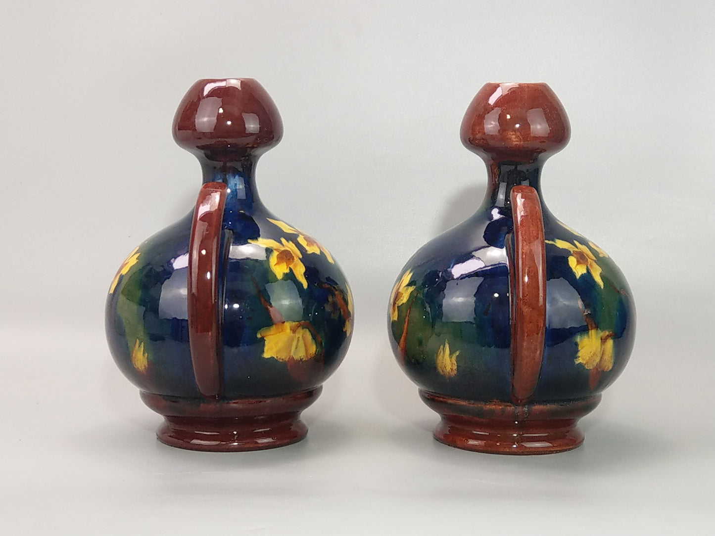 A Pair of Large Austrian Old Moravian Pottery Vases with Daffodils