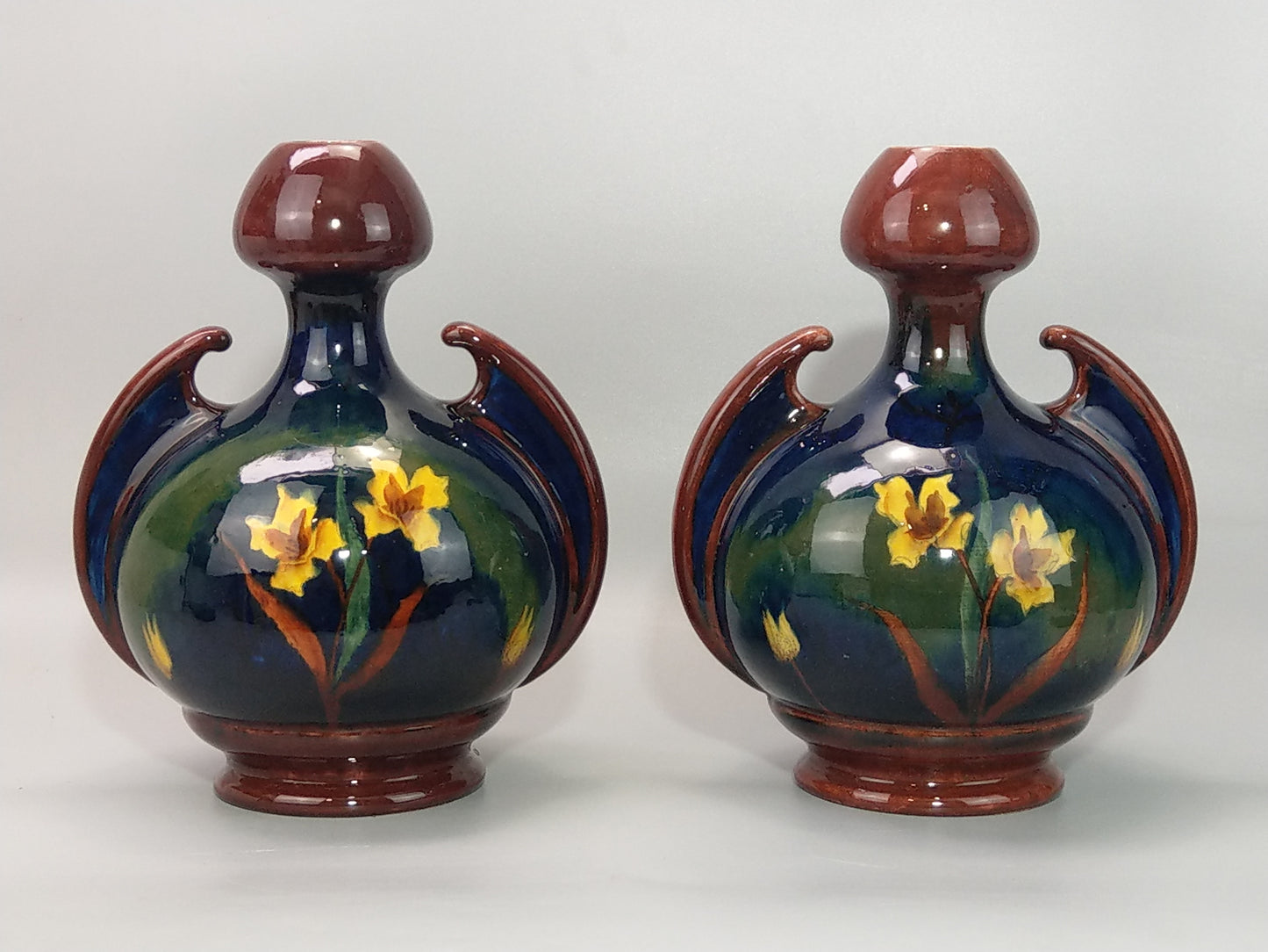 A Pair of Large Austrian Old Moravian Pottery Vases with Daffodils