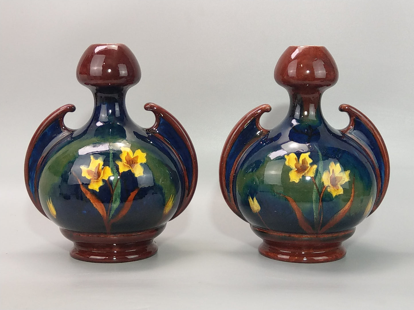 A Pair of Large Austrian Old Moravian Pottery Vases with Daffodils