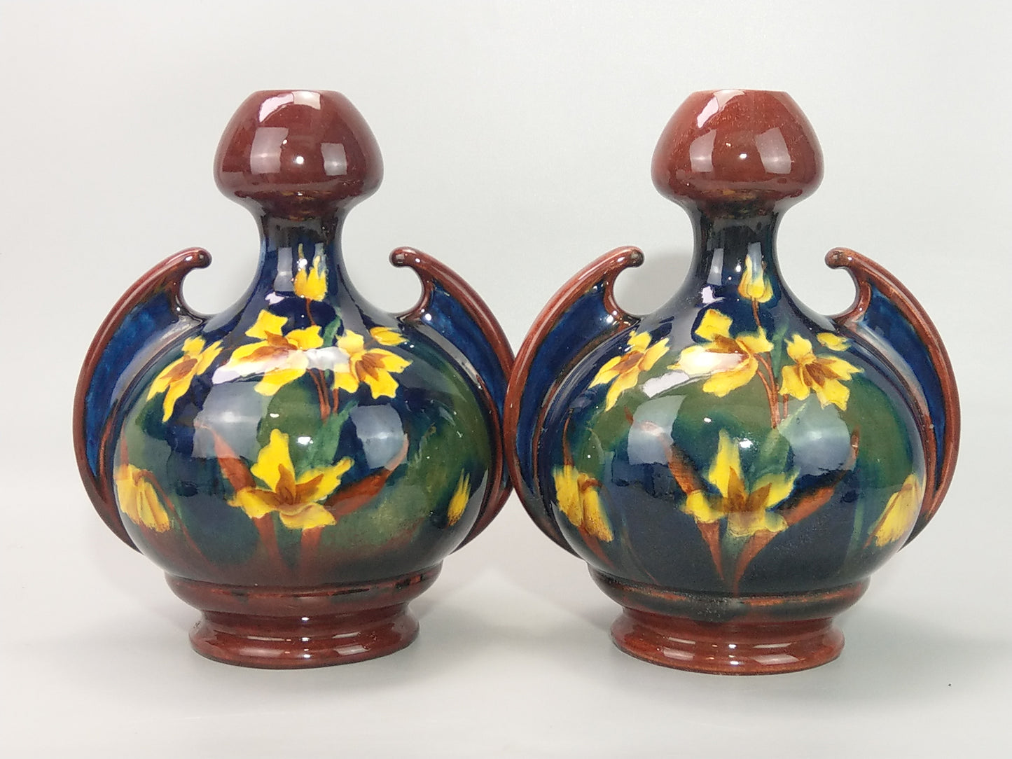 A Pair of Large Austrian Old Moravian Pottery Vases with Daffodils