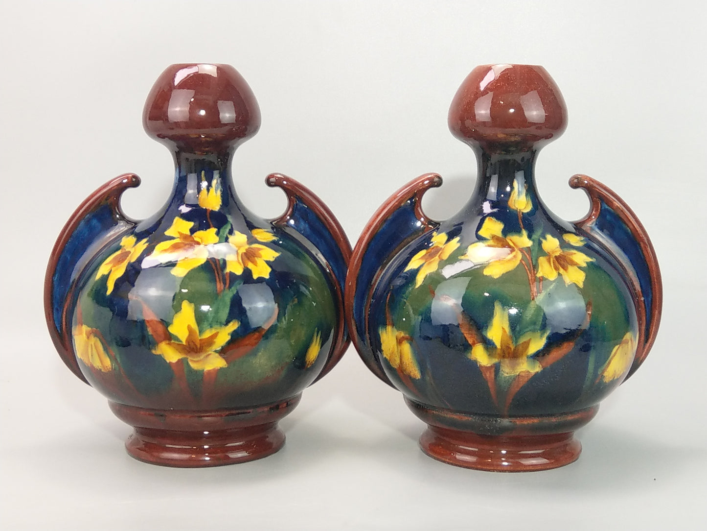 A Pair of Large Austrian Old Moravian Pottery Vases with Daffodils