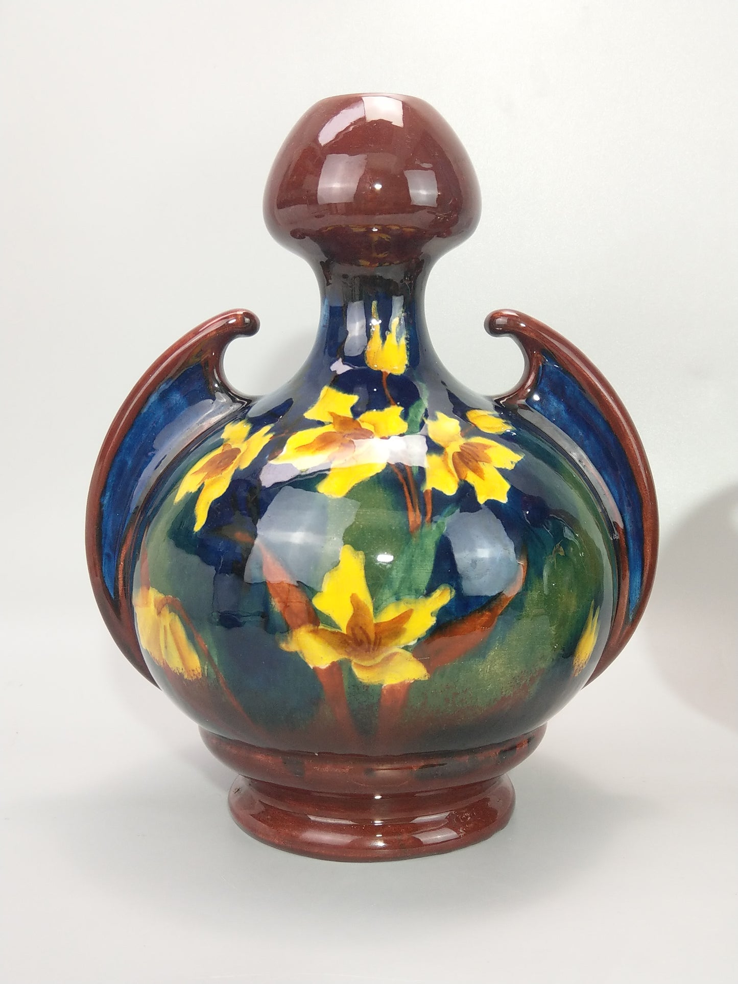 A Pair of Large Austrian Old Moravian Pottery Vases with Daffodils