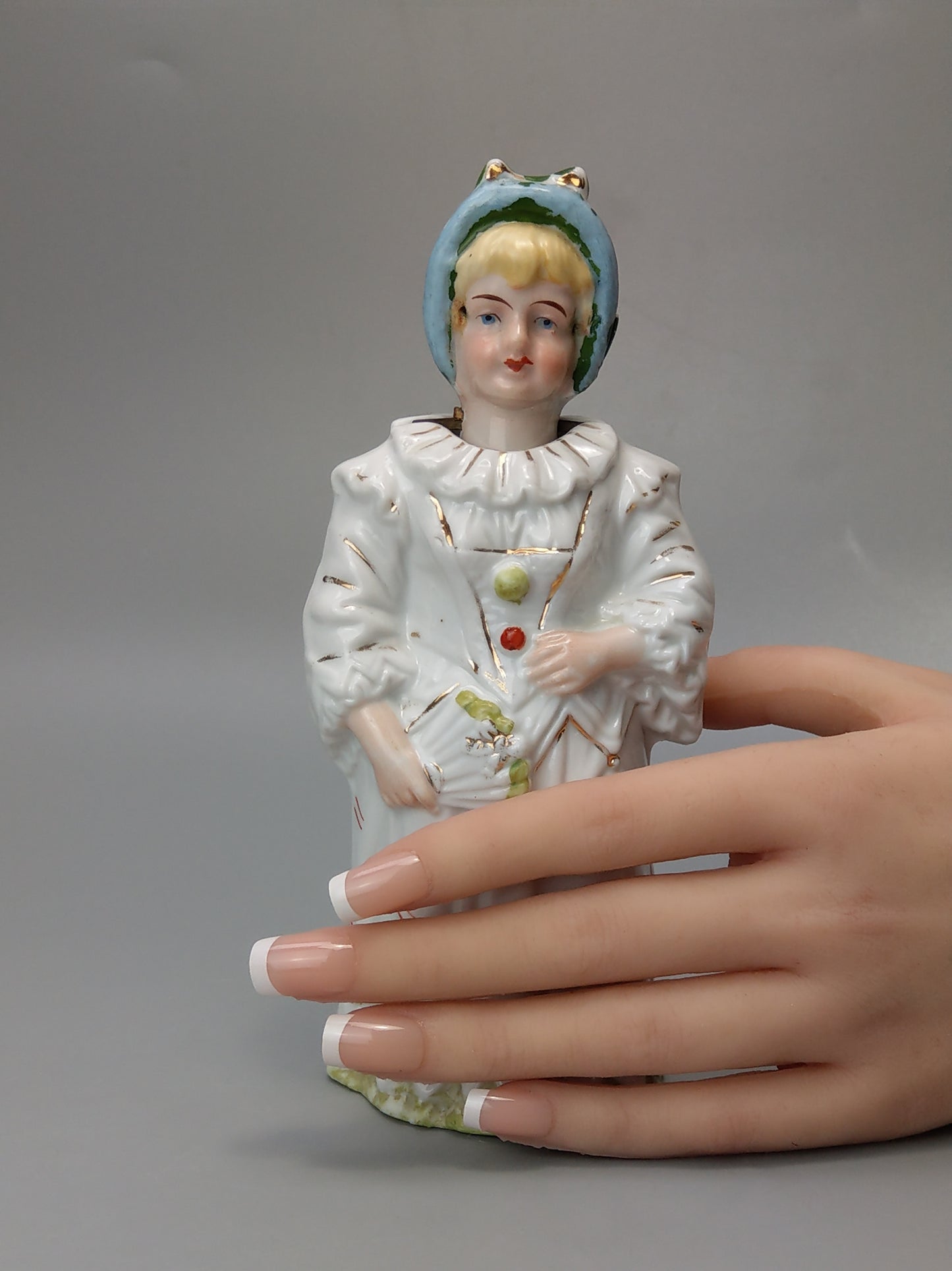 Nodding head figurine Girl in harlequin costume German Bisque porcelain