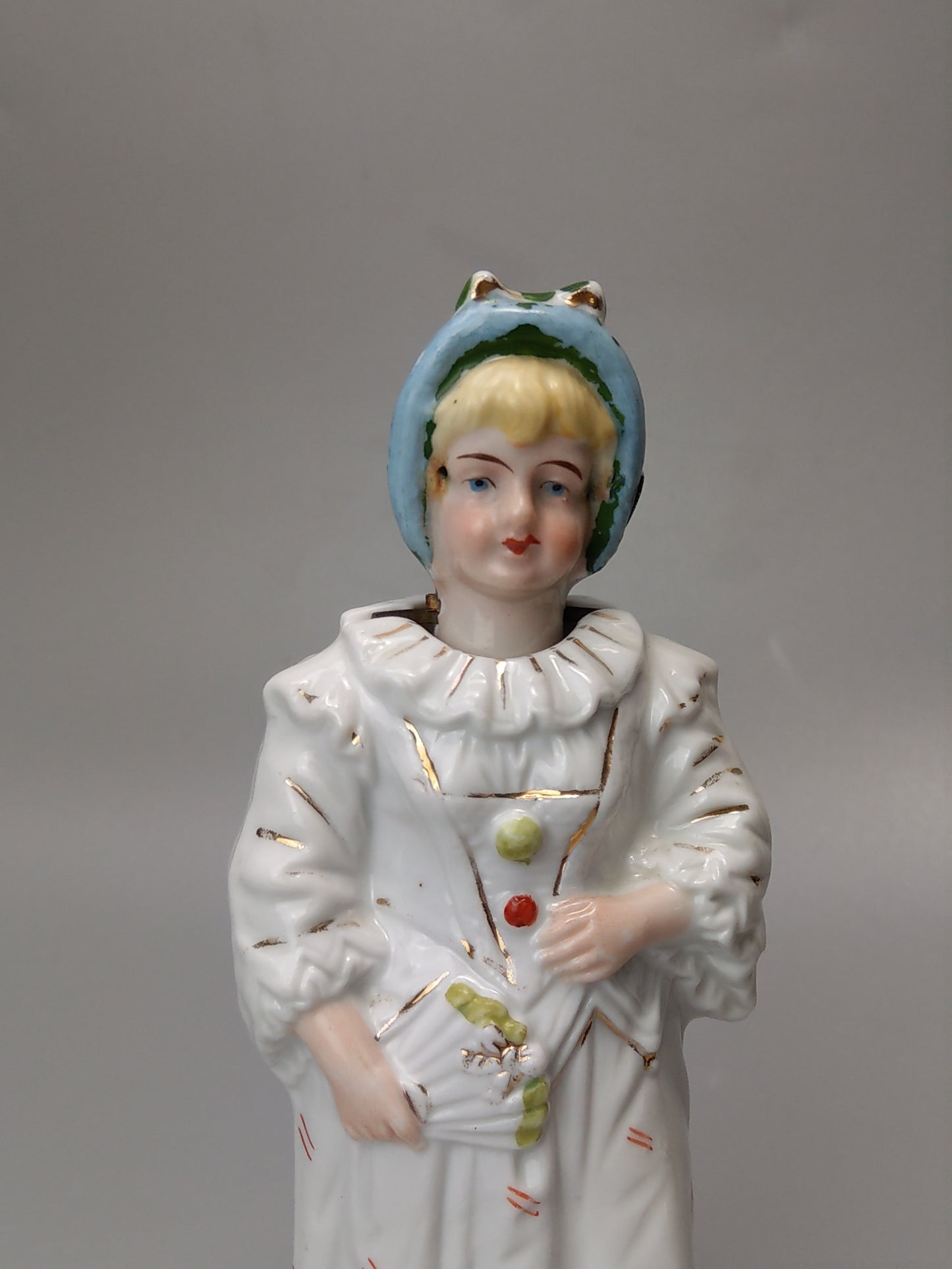 Nodding head figurine Girl in harlequin costume German Bisque porcelain