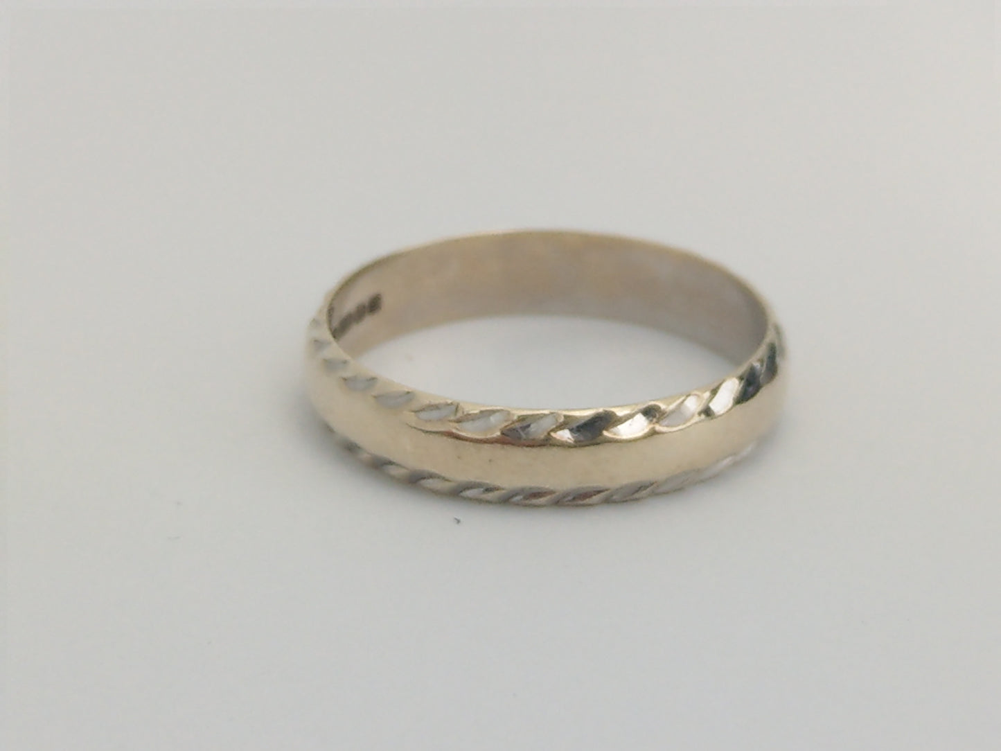 White 9ct Gold Simple Band Ring With Hammered Edge by Excalibur Jewellery