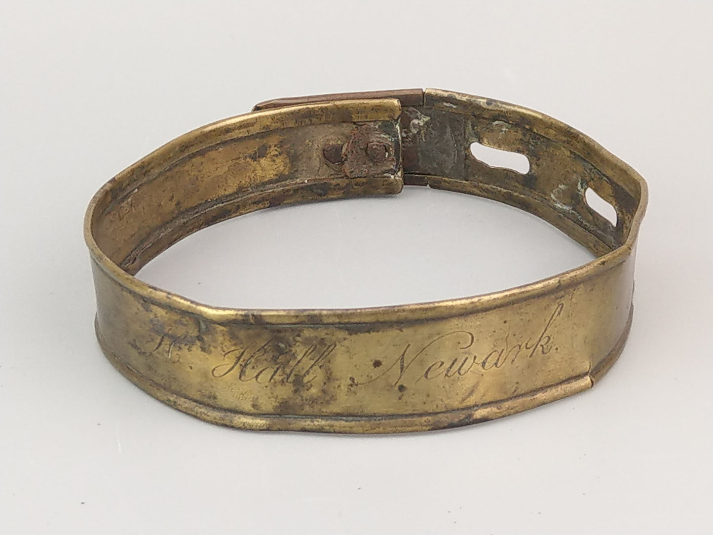 Early English sheet brass dog collar, late 18th century, engraved H. Hall Newark