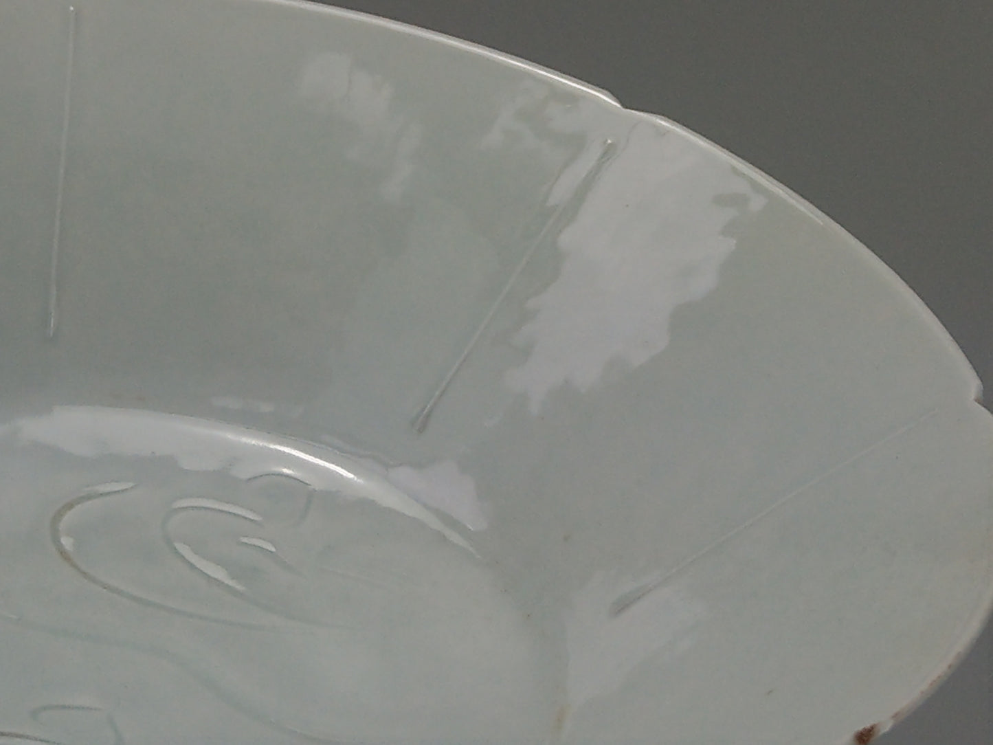 Chinese Qingbai conical porcelain bowl with duck egg blue glaze incised and foliate rim