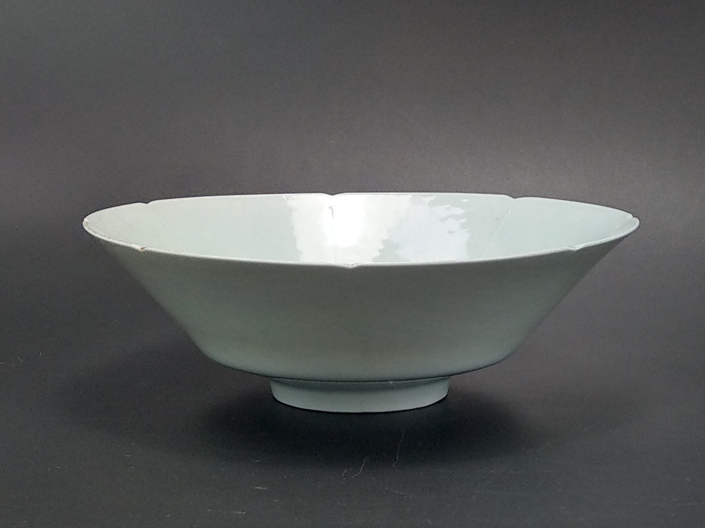 Prohibition Gems - Qingbai conical porcelain bowl with duck egg blue glaze incised and foliate rim