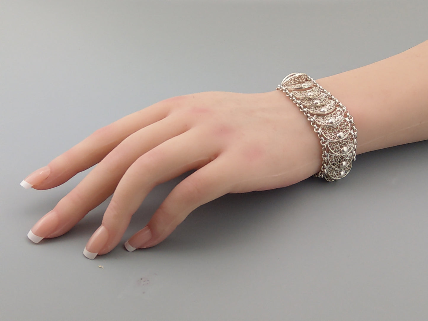 A parure Coin-Simulated Silver Filigree Bracelet and Necklace, Dutch c1960