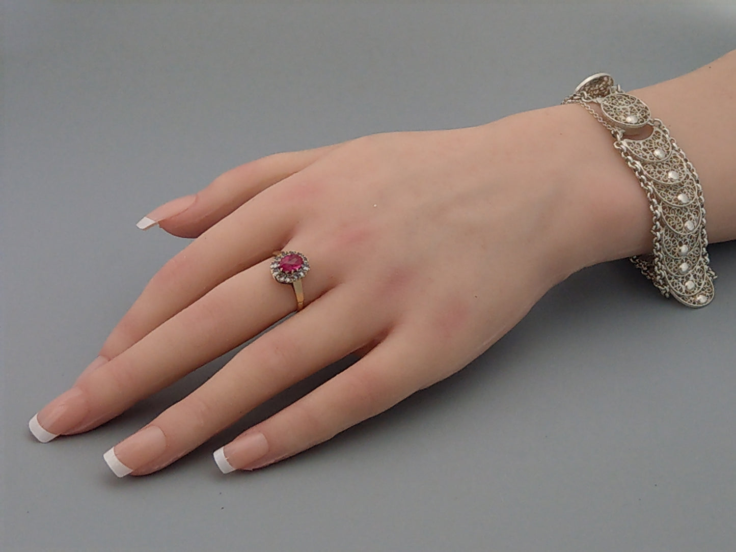 9ct Gold ring set with Pink Sapphire stone and white gem stones