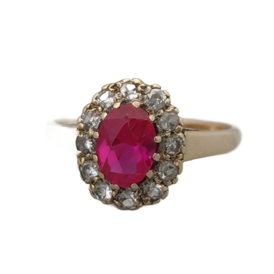 9ct Gold ring set with Pink Sapphire stone and white gem stones