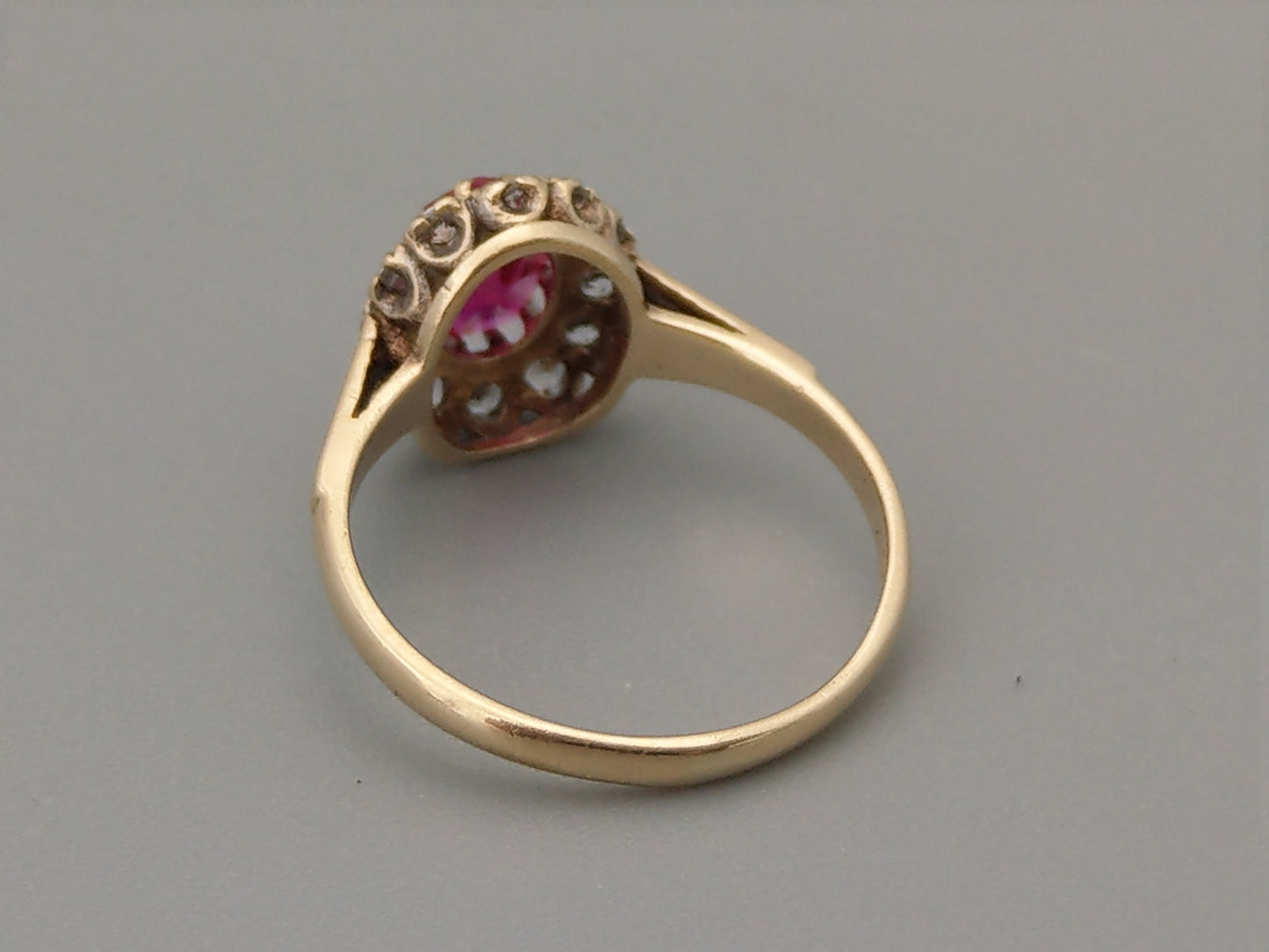 9ct Gold ring set with Pink Sapphire stone and white gem stones