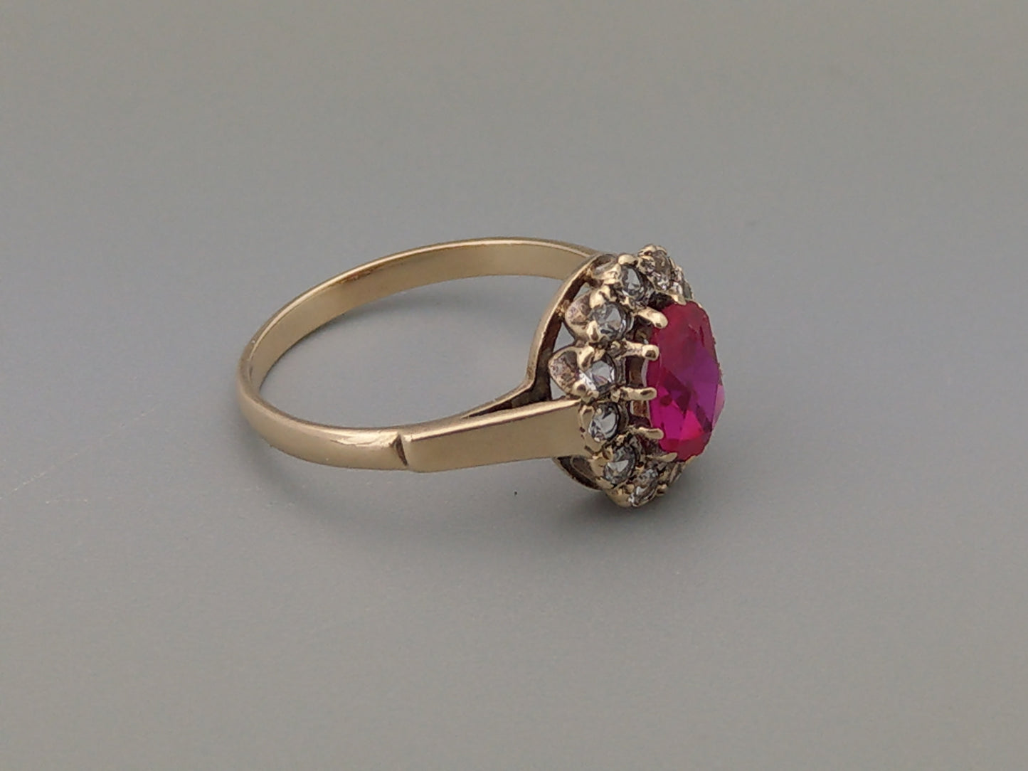 9ct Gold ring set with Pink Sapphire stone and white gem stones