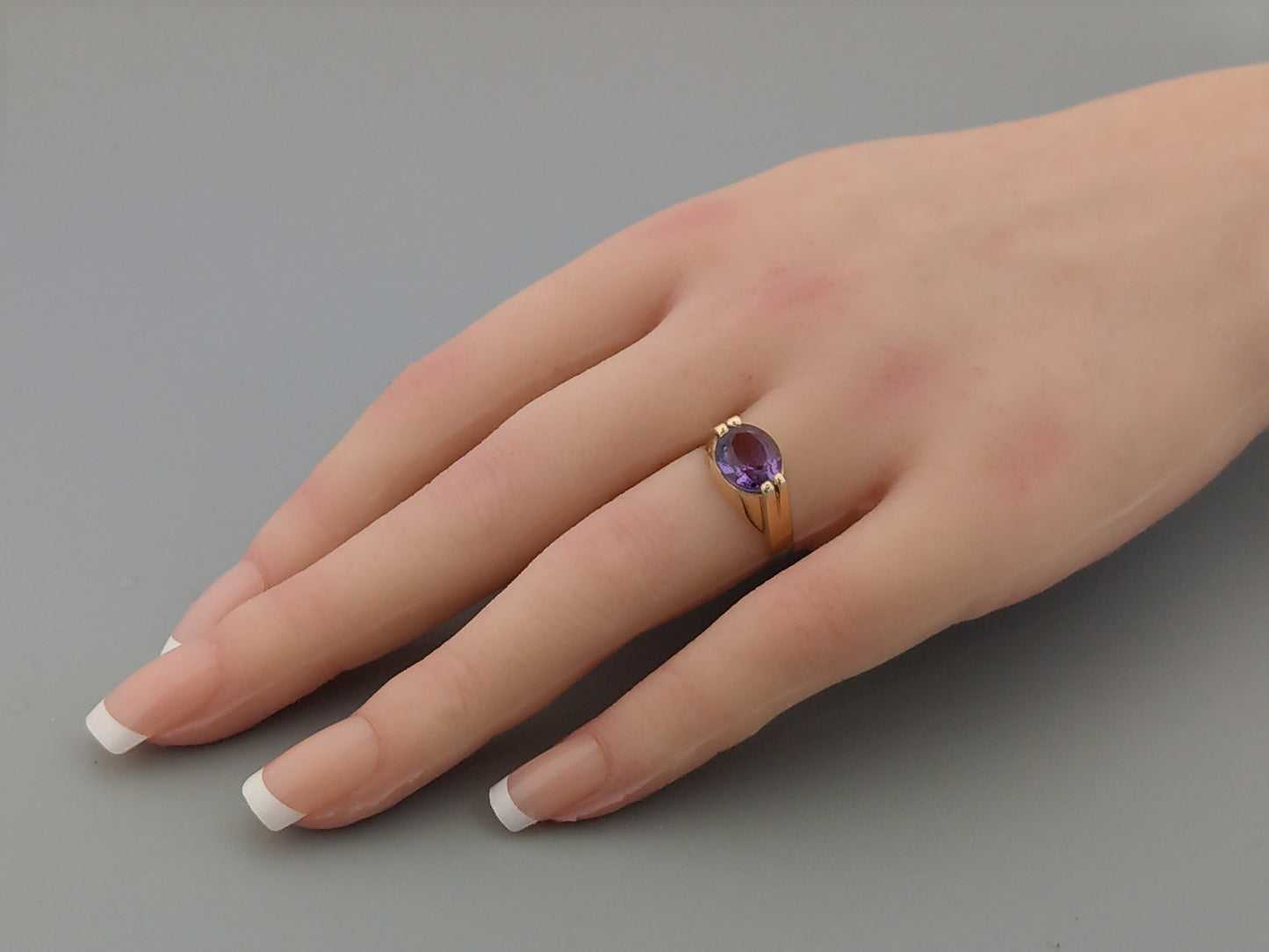 Large 9ct ring set with oval cut Amethyst