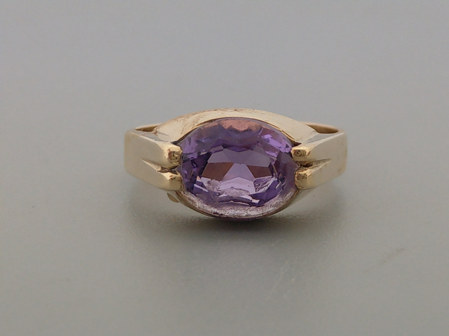 Large 9ct ring set with oval cut Amethyst