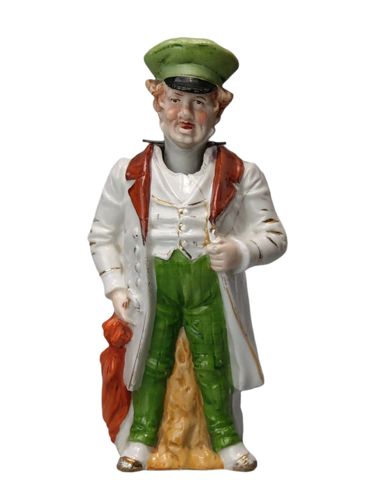 Nodding head figurine: Gentleman with umbrella, German bisque porcelain.