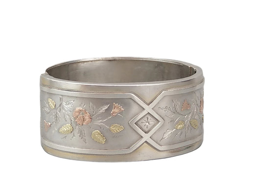 Antique sterling silver bangle with gold inlay flowers