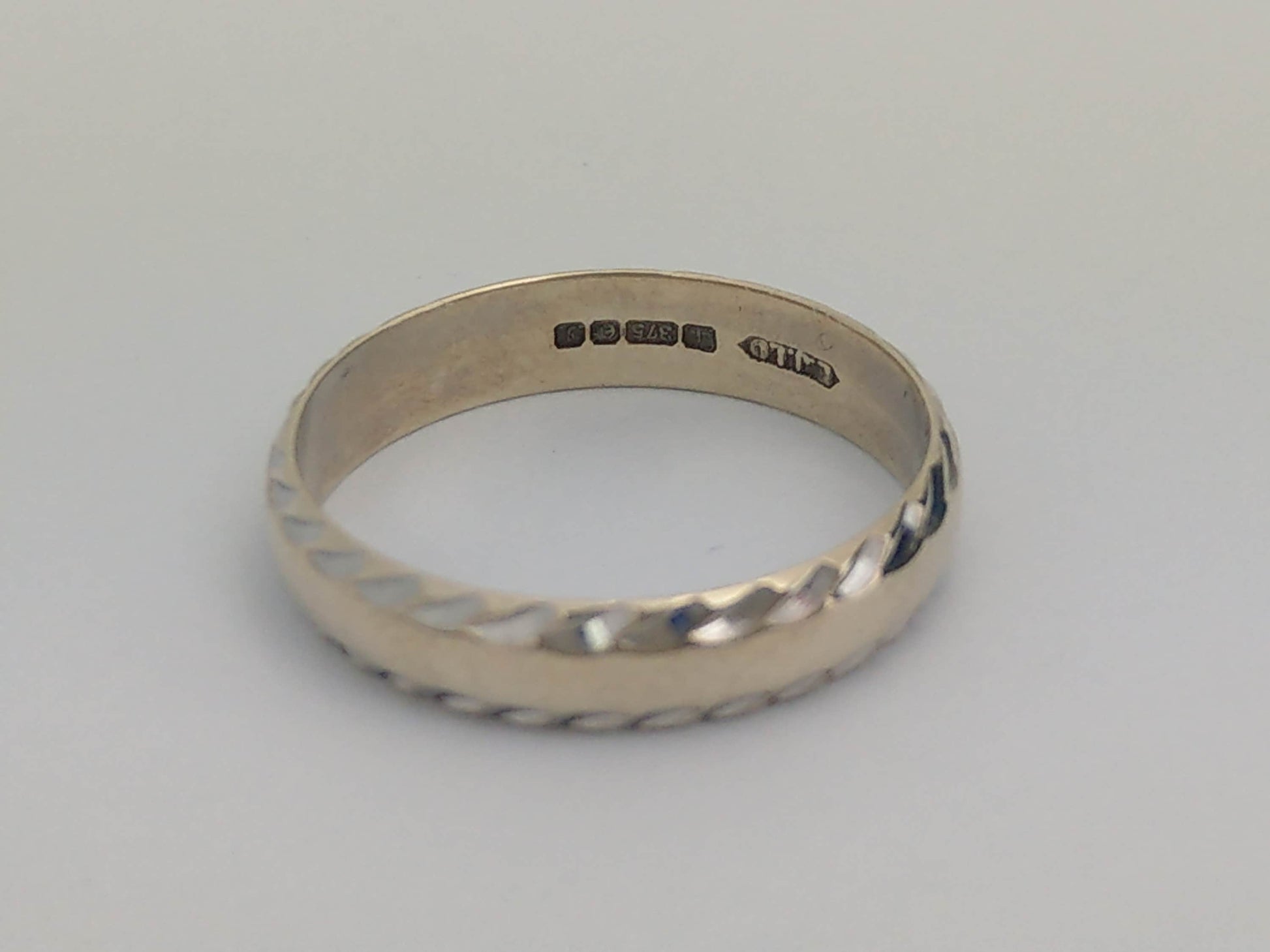 Prohibition Gems - White 9ct Gold Simple Band Ring With Hammered Edge by Excalibur Jewellery