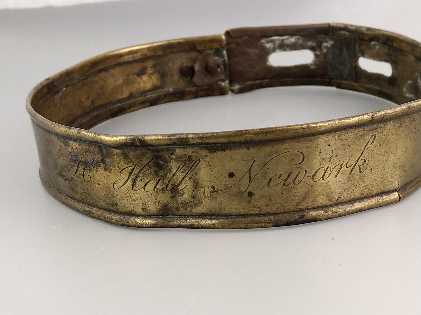 Early English sheet brass dog collar, late 18th century, engraved H. Hall Newark